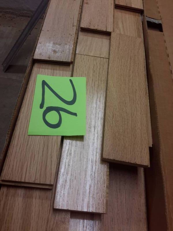 lot 26 image: Box of Engineered Oak Strip wood