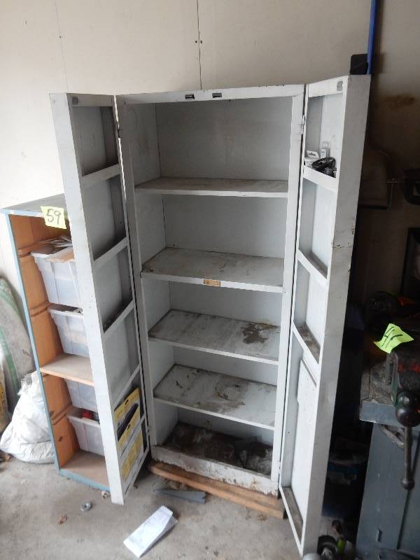 lot 58 image: Metal Cabinet with storage in doors