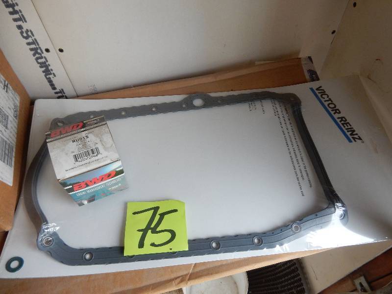 lot 75 image: Engine Gasket and Engine assembly.. Please inspect. .Both look new