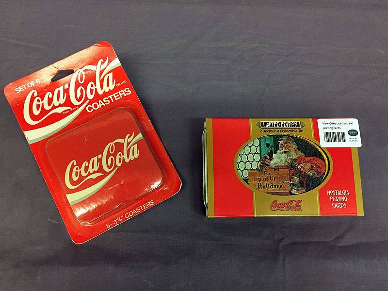 lot 28 image: New Coke coasters and playing cards