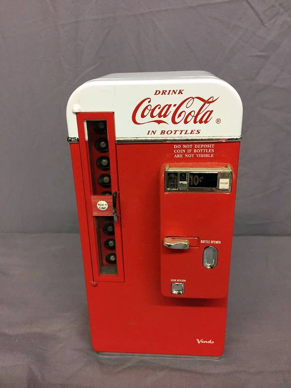 lot 44 image: Coke cooler piggy bank