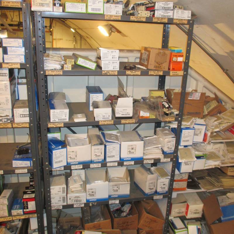 lot 57 image: Shelf  Contents of 100s of Switch Covers  Outdoor Electrical Boxes