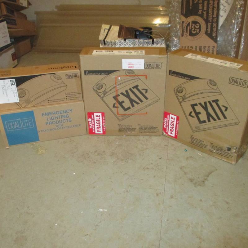 lot 74 image: (2) Lighted Exit Signs (2) Emergency Lights