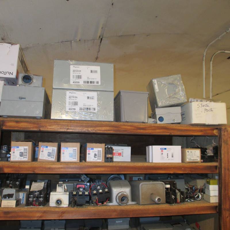 lot 81 image: Contents of 3 Shelves Circuit Breakers, Electric Service Boxes,