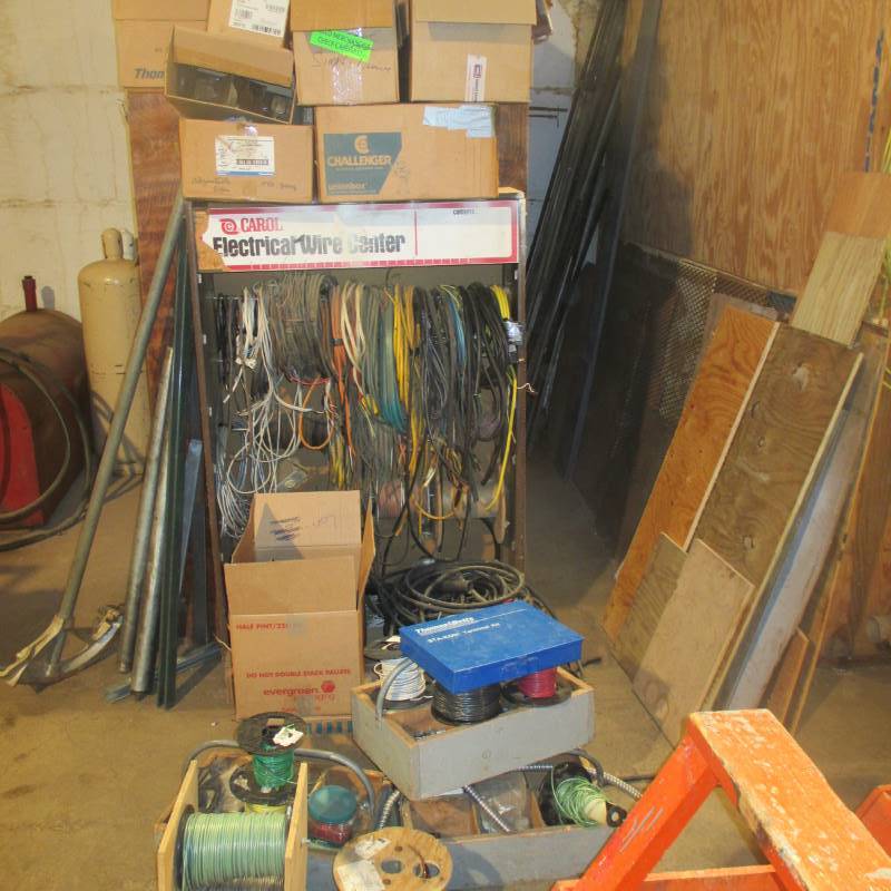 lot 135 image: Everything on End Rack Wiring Center (New) Boxes, Rolls of Wire