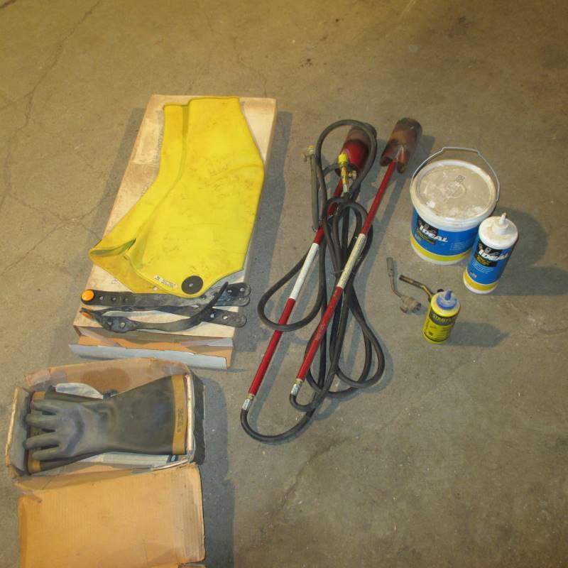 lot 154 image: (2) Propane Weed Burners, (New) Rubber Electricians SleevesGloves, Wire Pulling Lubricant
