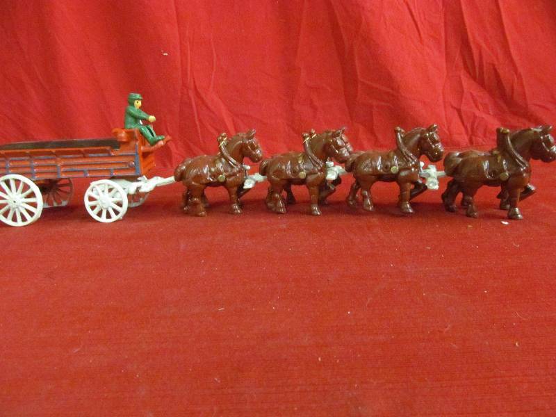 lot 71 image: cast iron horse and wagon