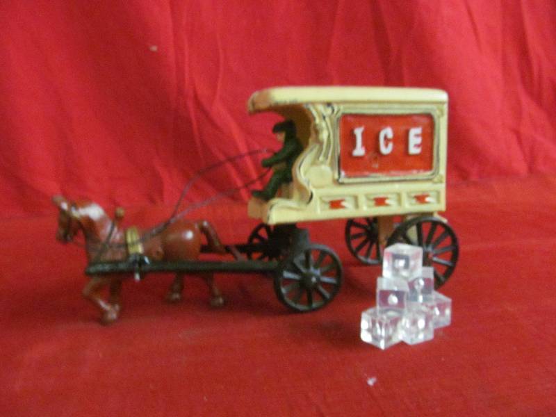 lot 101 image: cast iron ice wagon