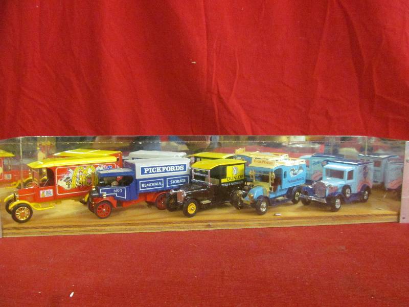 lot 108 image: display case with metal cars
