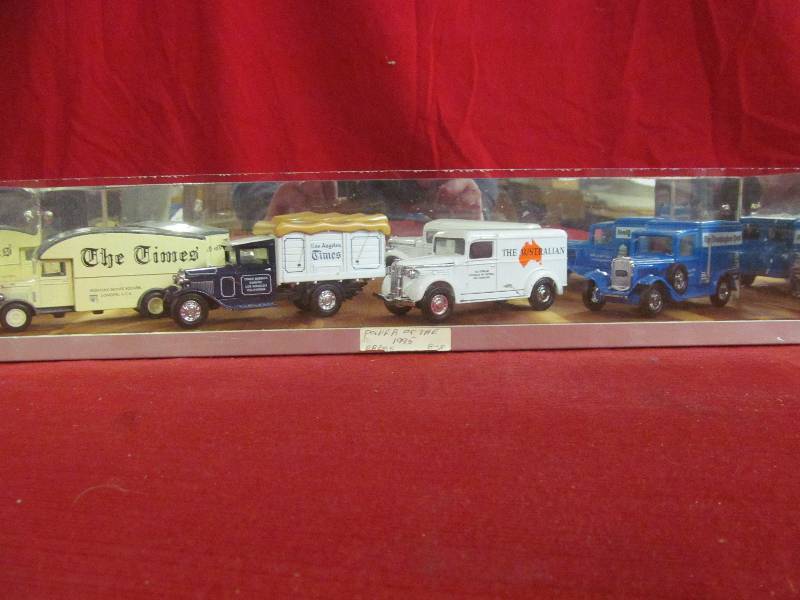 lot 109 image: display case with metal cars