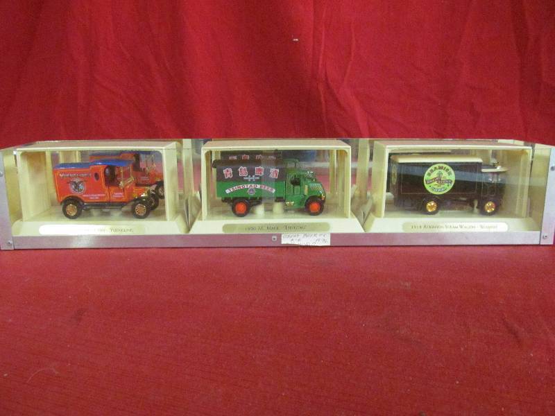 lot 110 image: display case with metal cars