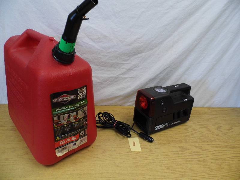 lot 11 image: Gas Can - 12V Air Compressor