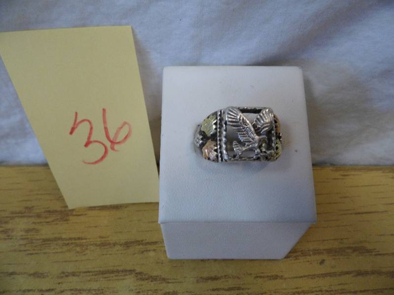 lot 36 image: Mens Black Hills Gold Silver Eagle