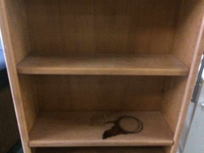 lot 49 image: Home Decor Solid Wood Bookcase - Has Stains On Shelves