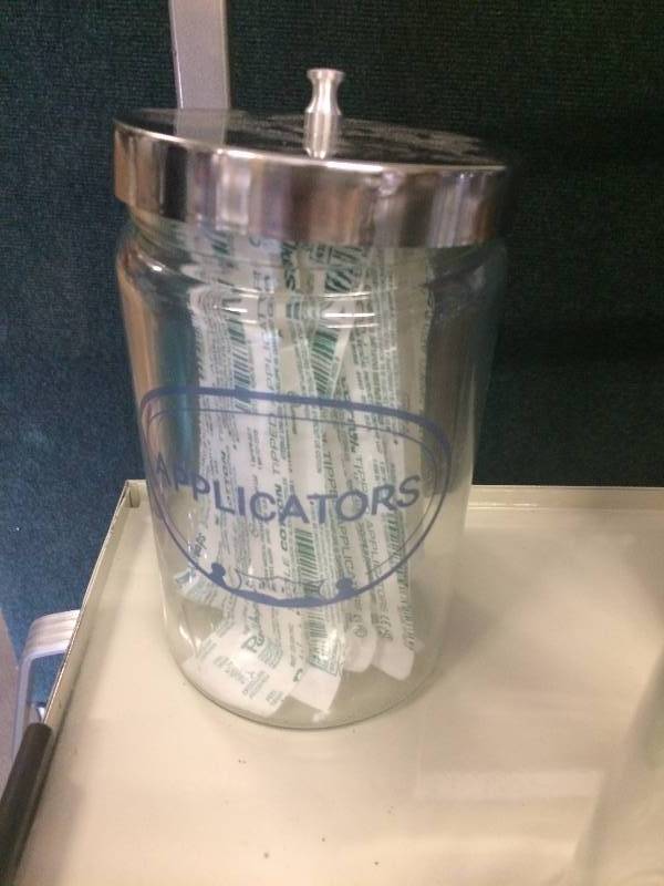 lot 53 image: Labeled Glass Medical Jars