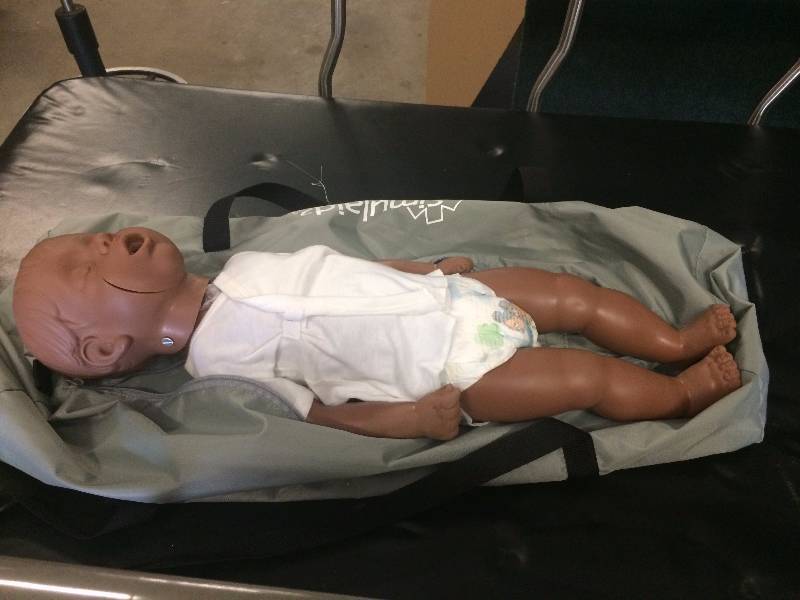 lot 57 image: Retails New $400 Simulaids Baby CPR Manikin Kevin 6 to 9 Month Old with Bag For CPR Training Demonstration Resuscitation On Infants - Excellent Condition