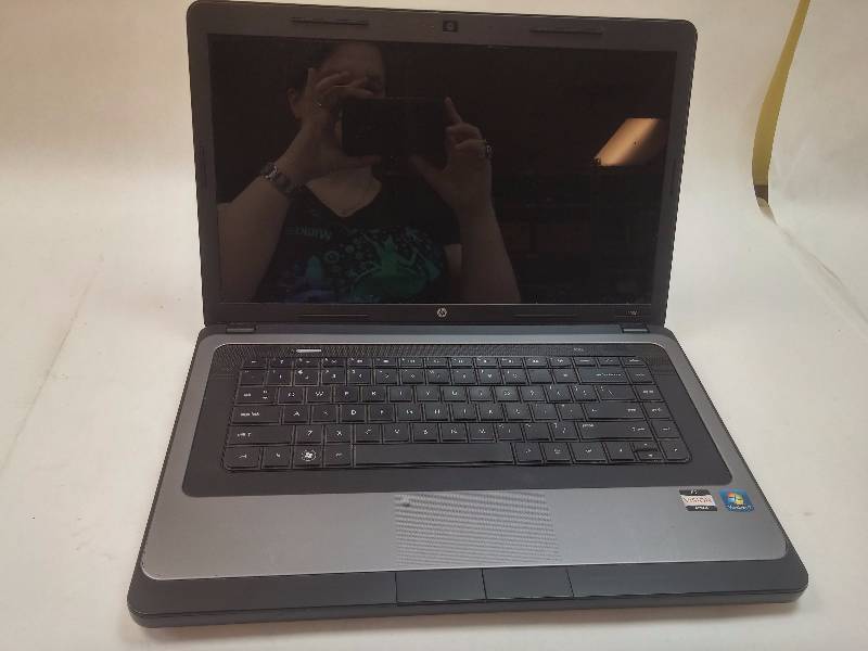 lot 824 image: HP 2000 15.8 Laptop Computer GOOD WORKING CONDITION
