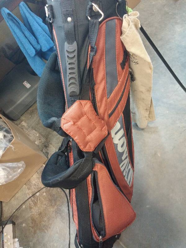 lot 639 image: Lot of 11 Clubs Wilson Deep Red II Iron Set 3-9, Wilson Deep Red II Pitching Wedge, Precise MDX II 500CC 10.5 Driver, Wilson Deep Red II Distance Driver Five - 18.0, Unbranded Putter, plus Wilson Golf Bag GOOD CONDITION