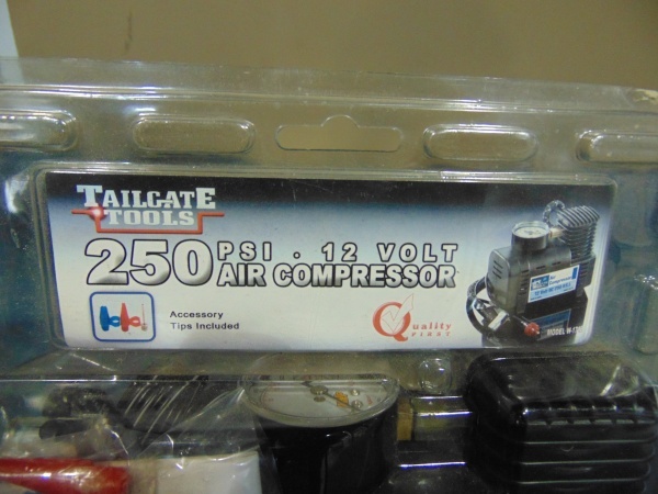 lot 40 image: NIB 12 Volt Air Compressor