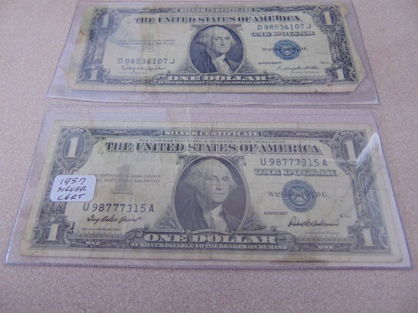 lot 103 image: (2) Silver Series Dollar Bills