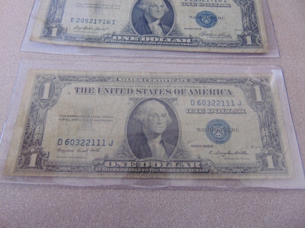 lot 101 image: (2) Silver Series Dollar Bills