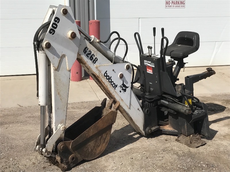 Bobcat 743 Skid-Loader, Bobcat Model 909 Hoe & Attachments | K-BID