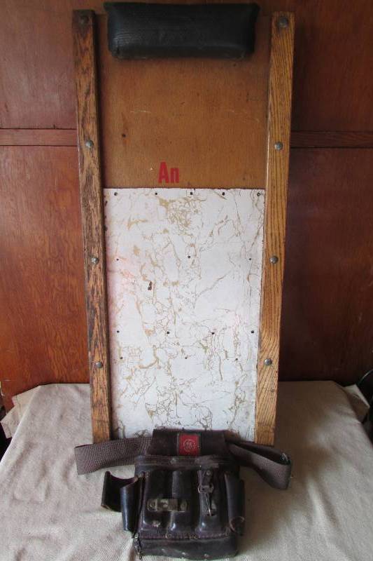 lot 15 image: Vintage Shop Creeper And Vintage G.E. Linesmen Tool Belt
