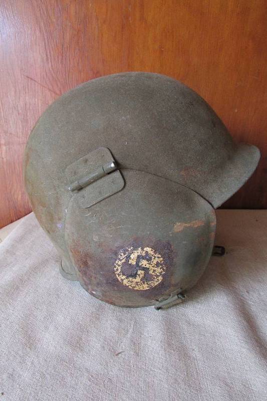 lot 1 image: Original World War II M-3 Flak Helmet