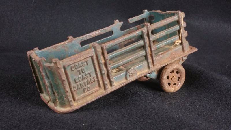 lot 8 image: 1920s 30s AC Williams Cast Iron Coast to Coast Cartage Co Stake Trailer