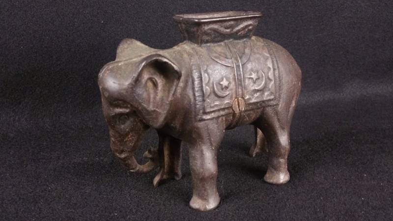 lot 13 image: AC Williams Cast Iron Elephant Coin Bank w Howdah
