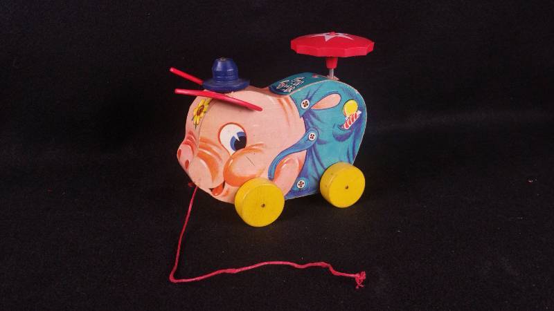 lot 19 image: Vintage Fisher-Price Pinky Pig Pull Toy  Trix