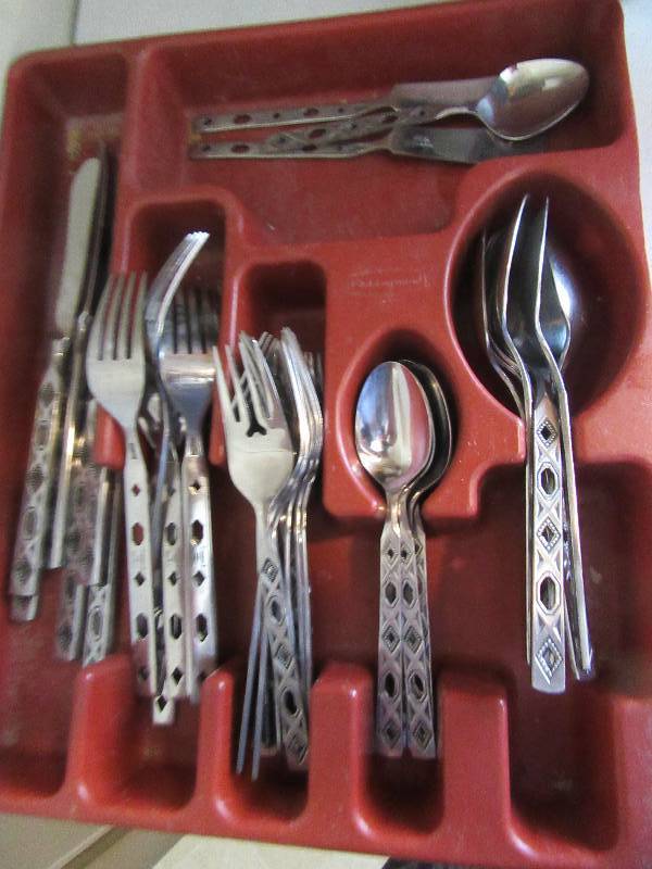 lot 99 image: Set of very fun kitchen silverware.   Rogers insilco.  ELITE STAINLESS. Not complete set