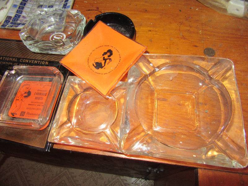 lot 115 image: Large lot of Ash Trays.  Beer Pitcher and glass Candelabra
