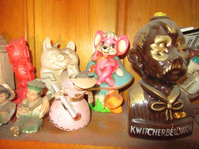 lot 107 image: Misc. Statuettes and decanters.. All empty
