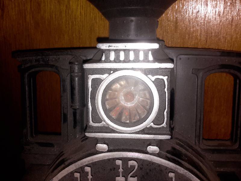 lot 36 image: Steam Engine Clock. .Has light in front of Stack