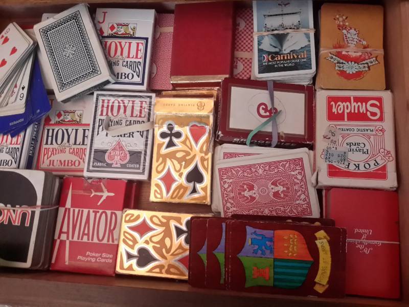 lot 55 image: Large lot of playing cards as shown