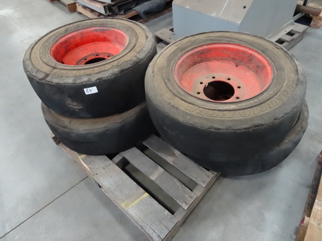 4 solid filled skid loader tires. R...
