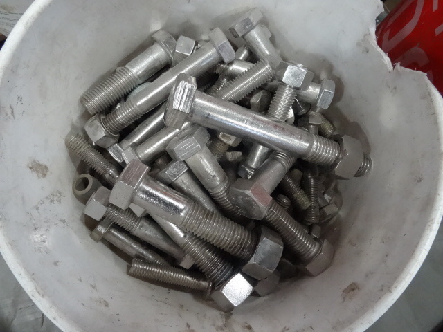 Bucket of a variety of stainless bo...