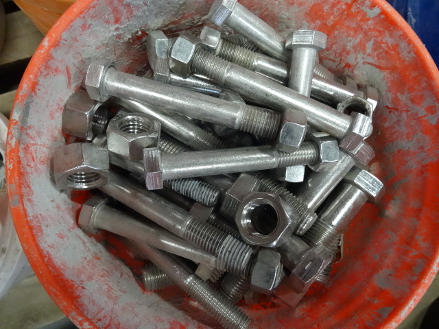 Bucket of a variety of stainless bo...