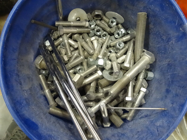Bucket of a variety of stainless bo...
