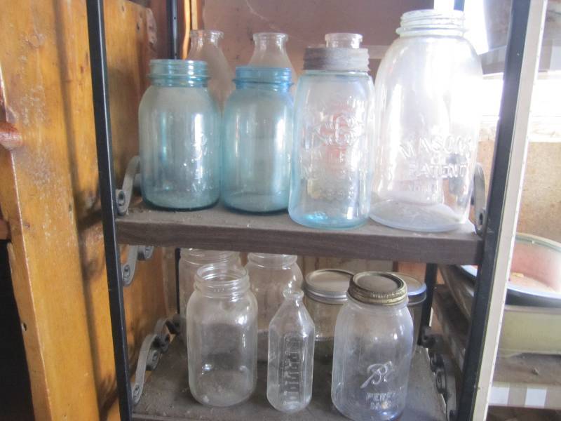 lot 42 image: Lot of Mason jars and milk bottles...