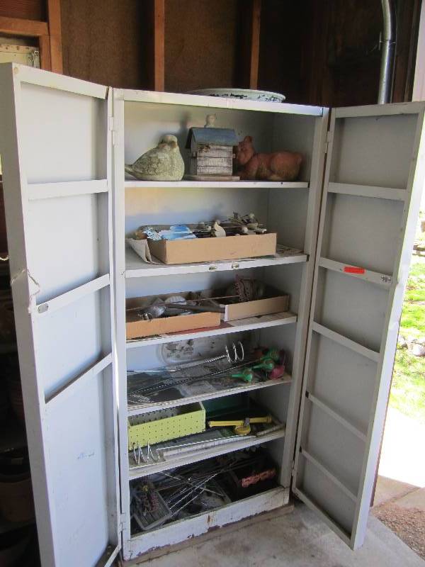 lot 49 image: Metal cabinet filled with garden or...
