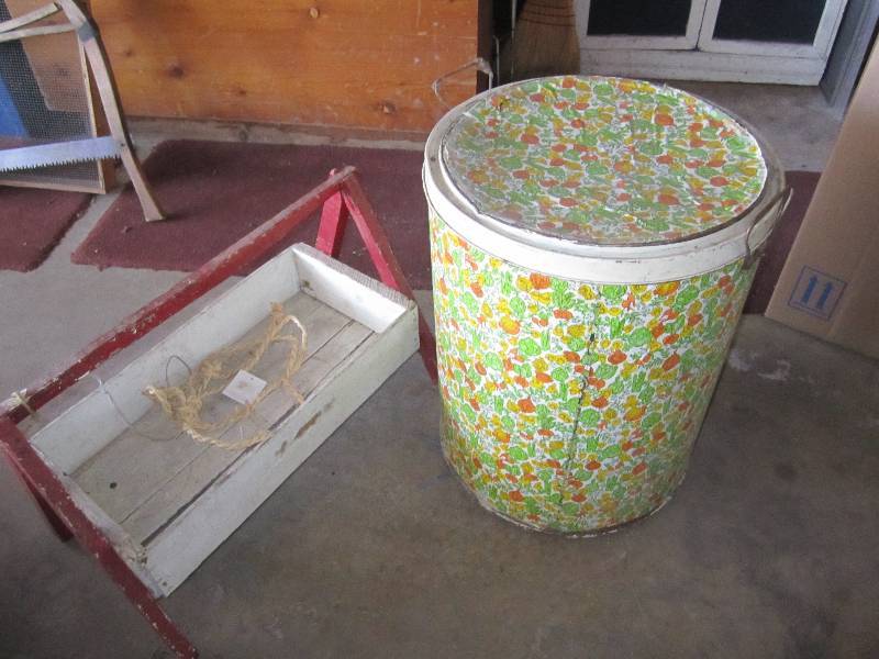 lot 64 image: Large canister and wood holder...