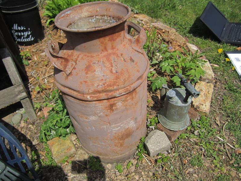lot 97 image: Vintage sprayer and milk can...