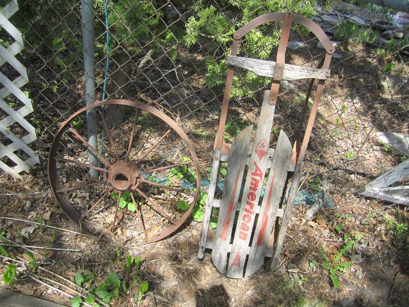 lot 100 image: Sled and wagon wheel...