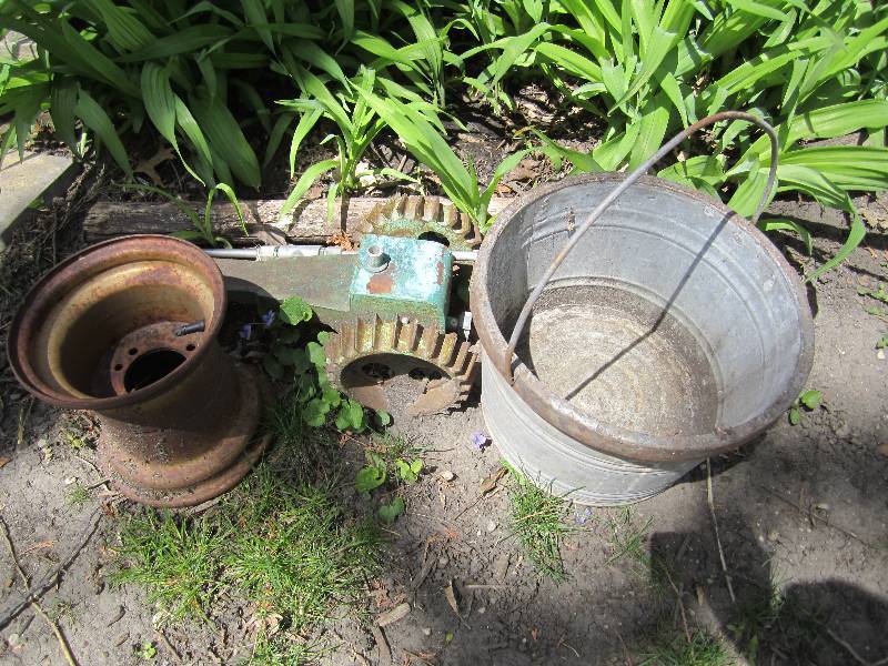 lot 110 image: Tractor sprinkler, wheel and metal ...