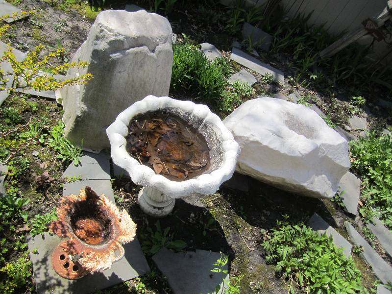 lot 124 image: Small Metal and large antique concrete bird bath with plastic boulders