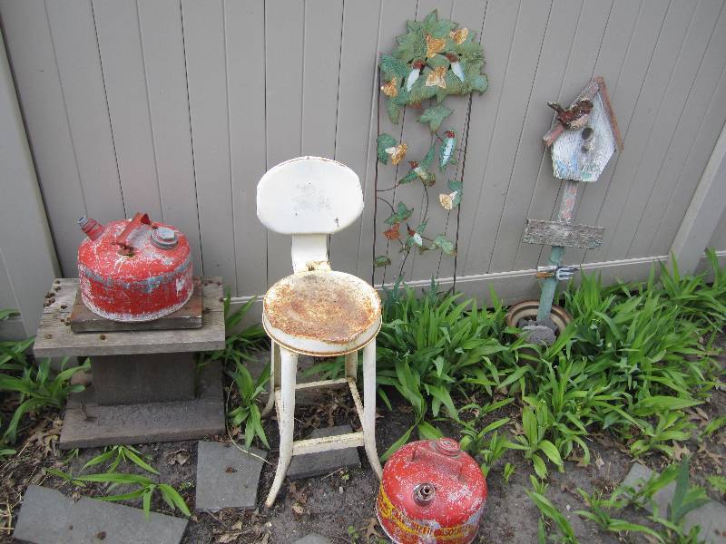 lot 128 image: Gas cans, stool and garden dcor...
