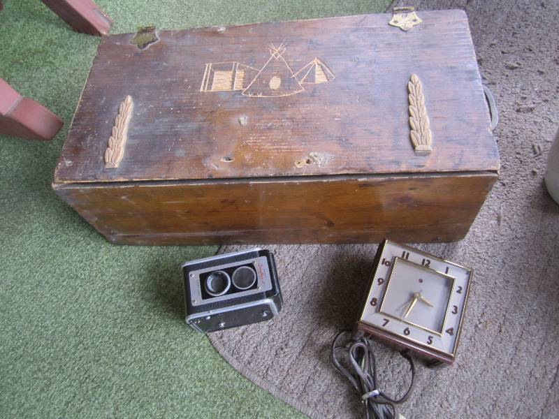 lot 160 image: Carved trunk clock and camera...