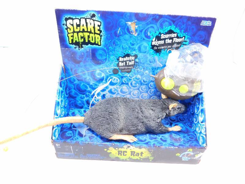 lot 20 image: Uncle Milton Remote Control Rat
